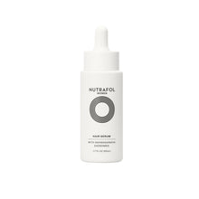 Load image into Gallery viewer, A white bottle with a dropper cap labeled Nutrafol Women's Hair Serum, with a minimalist design featuring black circle patterns.